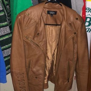 Laura’s boutique leather brown jacket